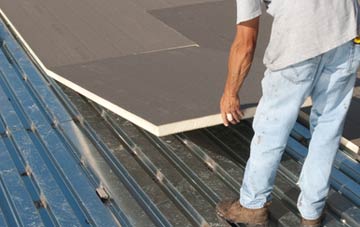 benefits of insulating New Barnet flat roofing